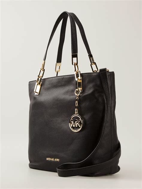 michael kors black purse with gold lock|michael kors large gold tote.